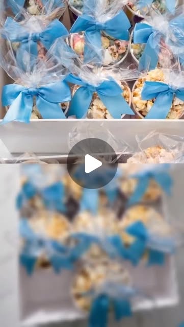 Popcorn party favors tied with blue bows